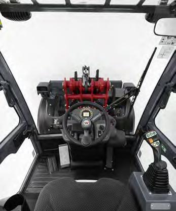 Ohjaussauva-konsoli ja käsinoja muodostavat säädettävän ja ilmajousitetun yksikön kuljettajan istuimen