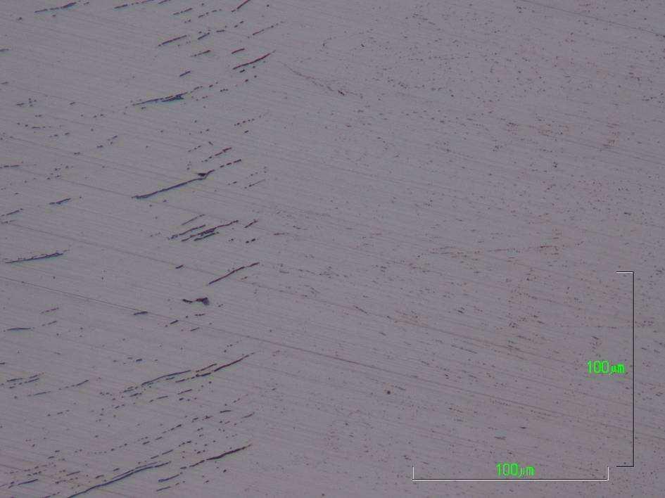 Kuvissa 18 ja 19 esiintyvät kiillotetut hieet on syövytetty NaOH:ssa 2,5 V jännitteellä n.