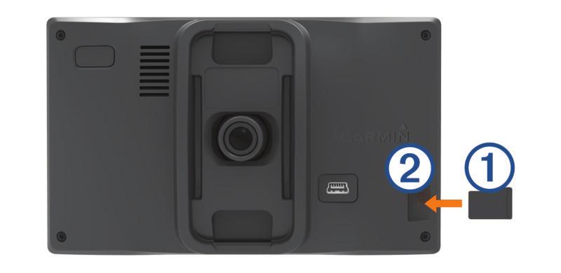 Kojelautakameran muistikortin asettaminen Aseta kameran muistikortti, jotta laite voi tallentaa videokuvaa sisäisellä kojelautakameralla.