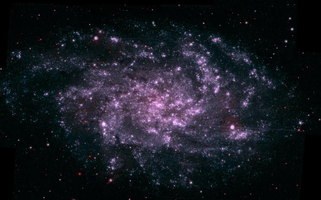 Kolmion galaksi (M33) M33 on Linnunrataa pienempi, (h R 1.7 kpc), V(R) 120 kms -1. Galaksissa on suhteessa paljon kaasua ja HI-kaasu levittäytyy hyvin laajalle alueelle.