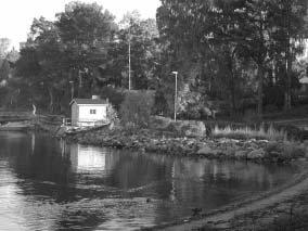 15 Lauttasaaren peruspiiri DRUMSÖ distrikt. I början av 19- talet började man bygga villor på Drumsö. Då gick dit en färja från staden. På 193-talet byggdes bron och vägen västerut till Esbo.