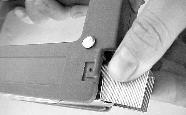 Press the magazine lock upward until it locks into place. Operation Using nails Fill the nails into the magazine as shown in figure 6.