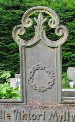 hautausmaan rautaristeissä: Kuoleman symbolina Taittunut