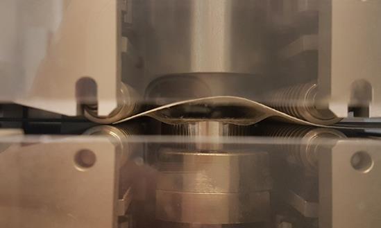 Figure 4. Illustration of sample delaminating during z-strength measurement.