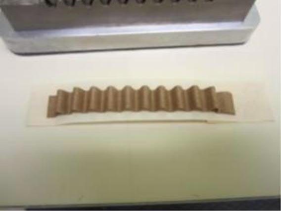 , 2017) Test specimen is loaded in the machine direction and the maximum force sustained by a test piece is recorded and expressed in Newtons.