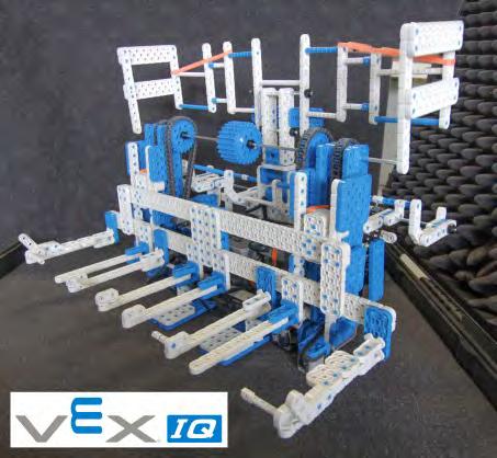 Ohjelmoitava keskusyksikkö, antureita ja VEX rakennussarja ohjeineen RobotC