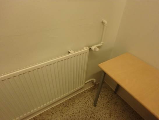 Kuntoarvio 18 (38) Lämmitysverkoston venttiileitä ja putkikytkentöjä.