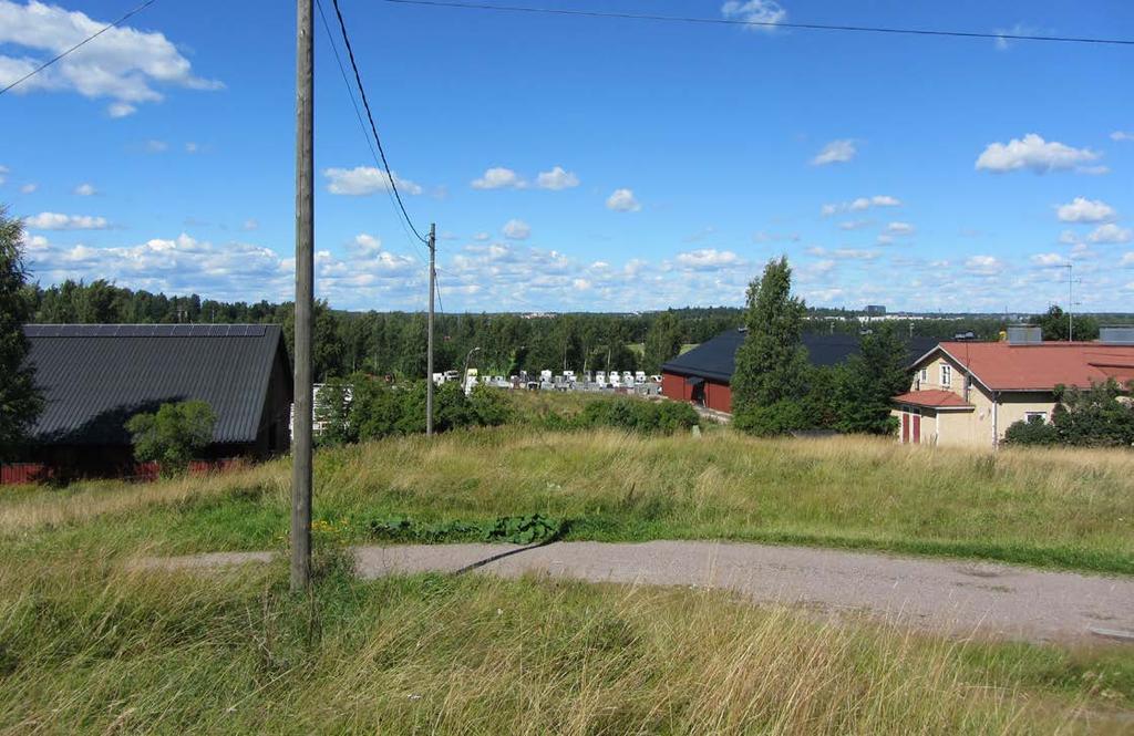 Näkymä avautuu Kaisanmäeltä (Tuomarinkylän kartano) Haltialan tilaan ja Vantaan Taimmistoon päin.