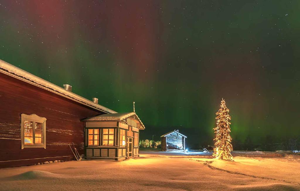 Tanon talo jouluvalaistuksessa. Äkäslompolon kylän ja suvun historia alkaa näiltä sijoilta.