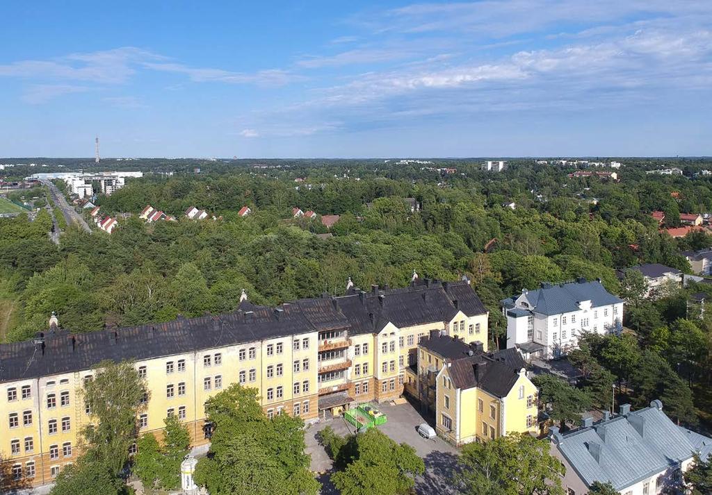 Kurjenlinnan Portin uudisrakennus sijoittuu puistomaiselle tontille
