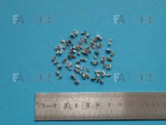 E particles of some 10 mm² size or less and bended due to the destruction process.