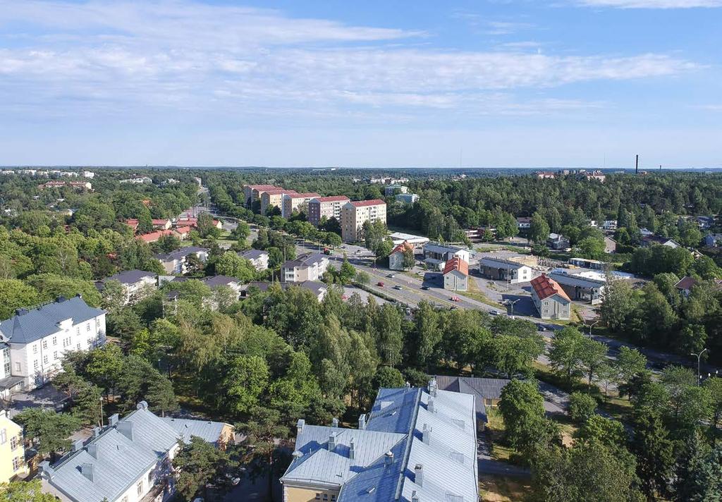 Kurjenlinnan Portin uudisrakennus sijoittuu puistomaiselle tontille