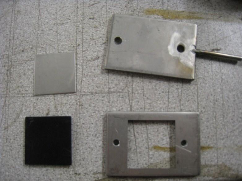 c) a) b) d) Figure 26. Pieces of a sample holding blade: a) a filling foil b) a polyethylene sample c) a back piece of a blade d) a front piece of a blade 7.2.2.2 Erosion Experiments Once the samples were attached to the blades, blades were attached to the impellers and impellers to the shafts.