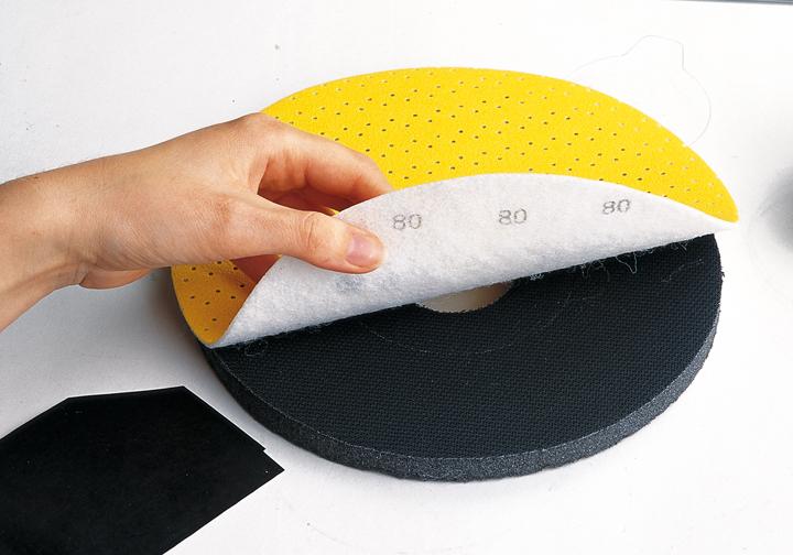 Velcro-tarrajärjestelmä hiomalaikan kiinnittämiseen. Soveltuu mm. purseidenpoistoon.