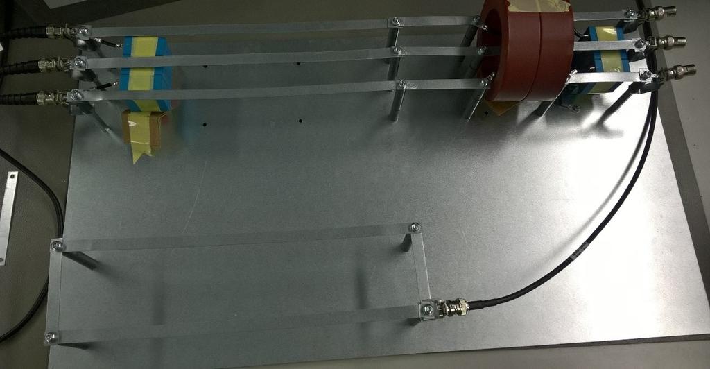 53 Figure 41. Measurement model with capacitors placed close to the grid connection The simulated and measured results are presented in the figure 42.